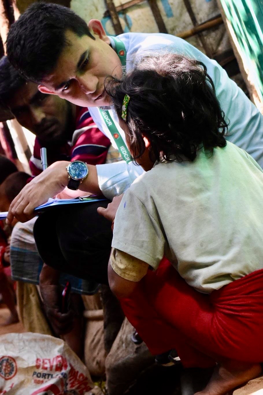 Mohammad Gazi Shah Alam conducting fieldwork in a community setting